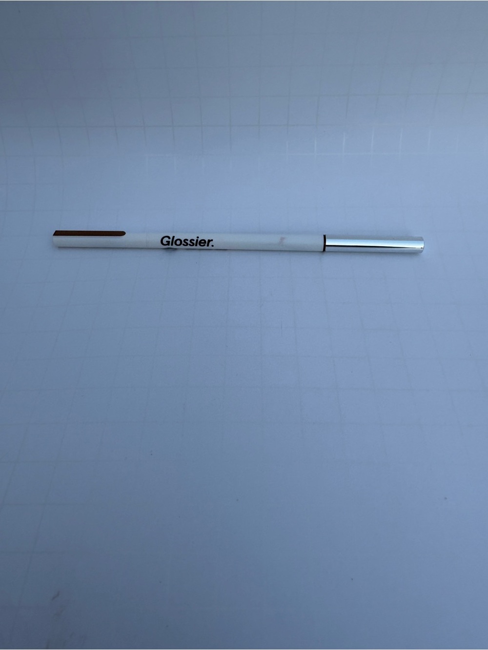 Glossier White Pencil with Silver Cap and Brown Tip